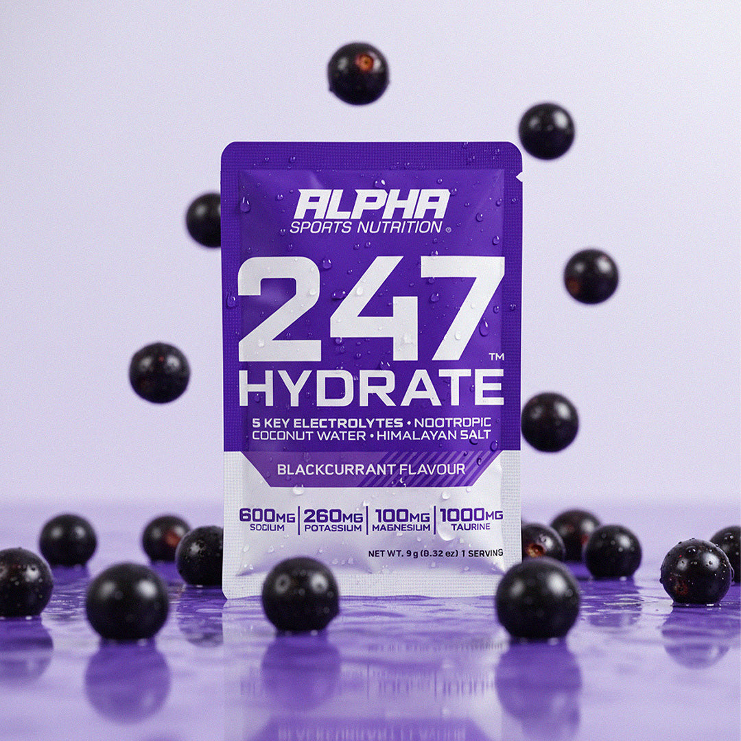 Alpha Sports Nutrition 247 Hydrate packet with blackcurrants on a purple background