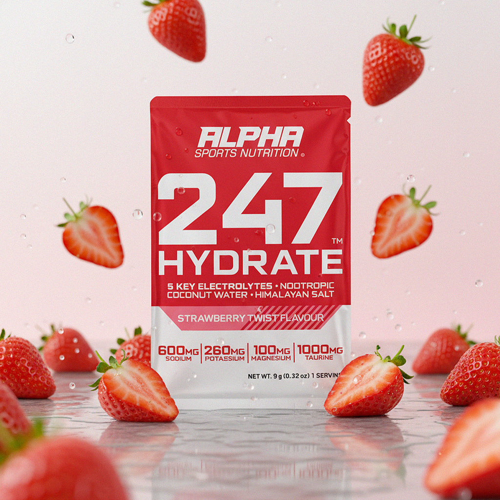 Alpha Sports Nutrition 247 Hydrate packet with strawberries on a light pink background