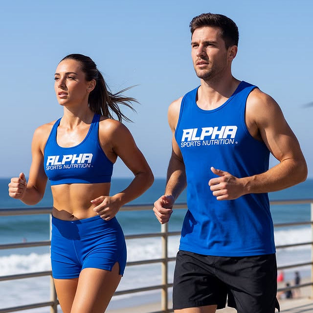 Two people wearing Alpha Sports Nutrition athletic wear running on a beach.
